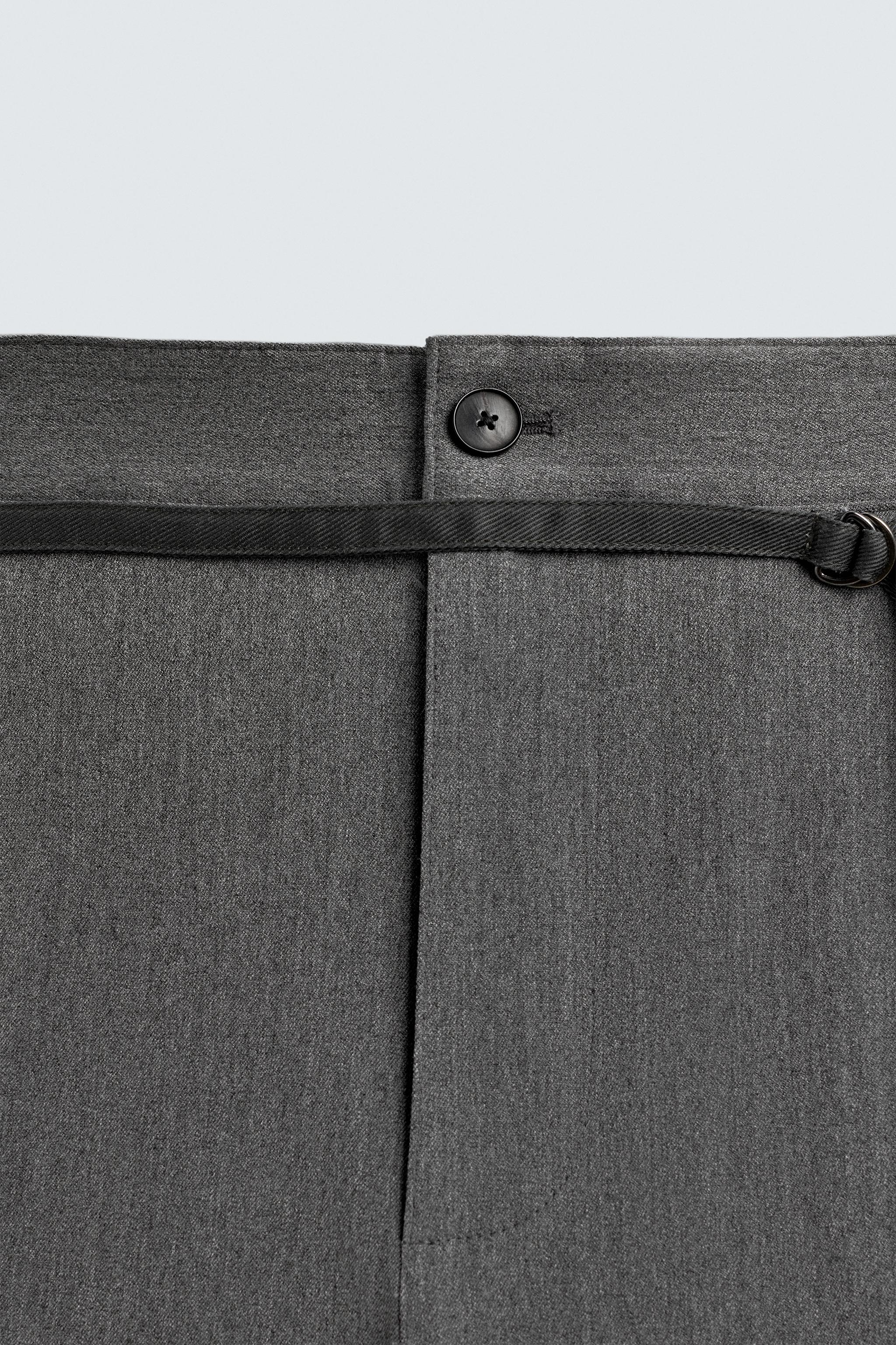 BALLOON PLEATED BELTED PANTS